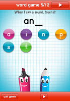 A word game screen from one of the top 10 mobile apps for children shows "an_" with letter options on colourful circles. Two cartoon writing tools with faces sit at the bottom, with "quit game" and "next" buttons on the screen.