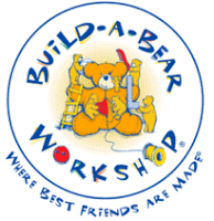 Build-A-Bear Workshop logo featuring a teddy bear holding a red heart, surrounded by tools, with colourful text and the slogan “Where Best Friends Are Made,” supporting children in need.