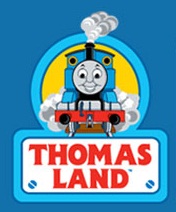 Logo for Thomas Land at Drayton Manor, featuring a smiling cartoon blue train engine with a face emitting steam, above a sign that reads "THOMAS LAND" in bold red letters on a white background—perfect for Magical Christmas fun.