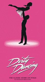 Silhouette of a man lifting a woman in a dance pose on a pink background, with "Dirty Dancing" in bold white script below and "The Classic Story on Stage" underneath—relive the Time of My Life with this timeless show.