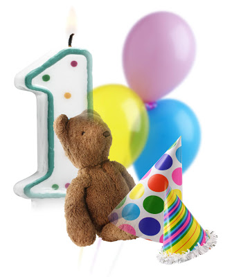 A teddy bear and balloons make the perfect festive touch for a first blog anniversary celebration.