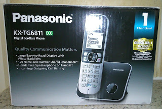 A product box for the Panasonic KX-TG6811 Digital Phone, featuring an image of the phone and charging base, highlighted features, and bold Panasonic branding.