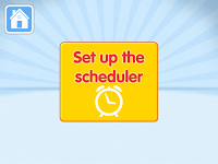 A yellow box with red text says "Set up the scheduler" above an alarm clock icon. A blue button with a white house icon is in the top left, whilst light blue rays and a subtle Woolly & Tig theme brighten the background.