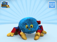 A fuzzy blue cartoon spider with yellow and red legs stands on a light background, resembling the beloved Woolly from Woolly & Tig. The corners display a small spider icon and a button labelled “Cover ups: Press and hold.”.