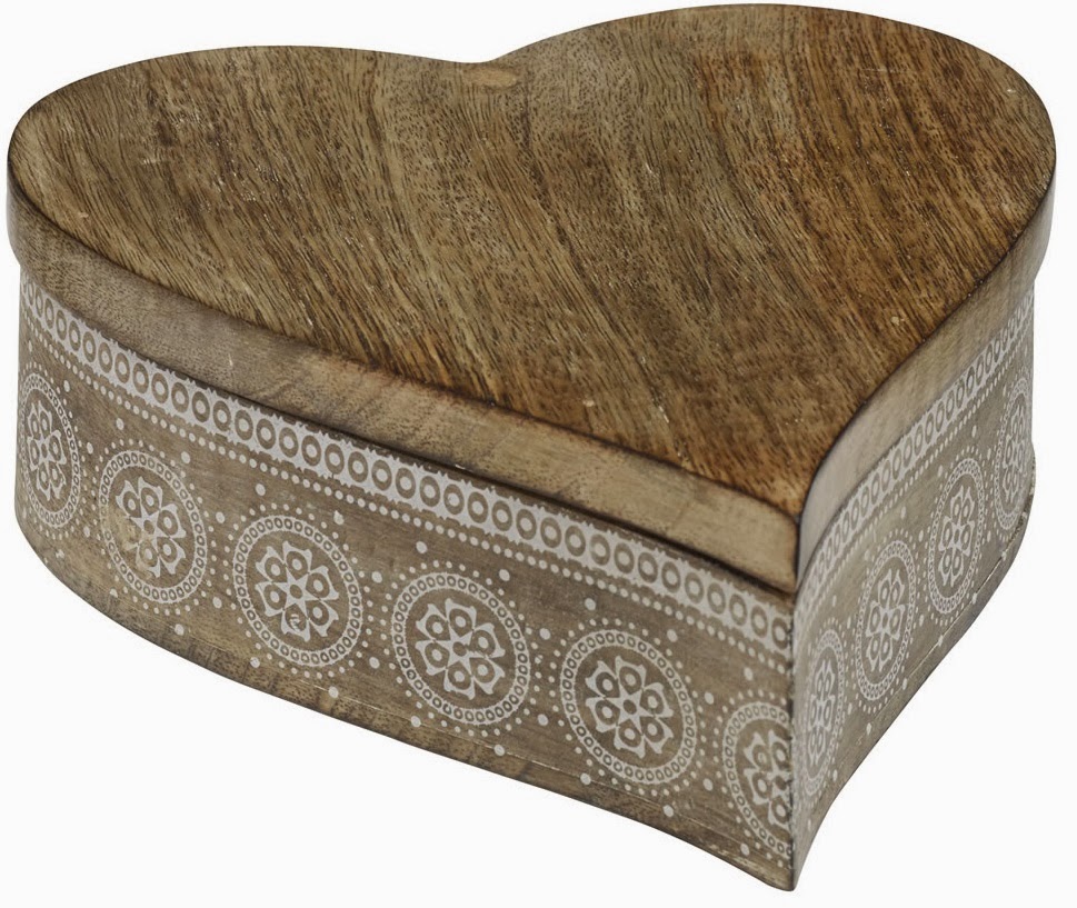 A heart-shaped wooden box from Wilko with a smooth lid and sides decorated with white circular floral patterns—perfect for Valentine’s Day gifts.