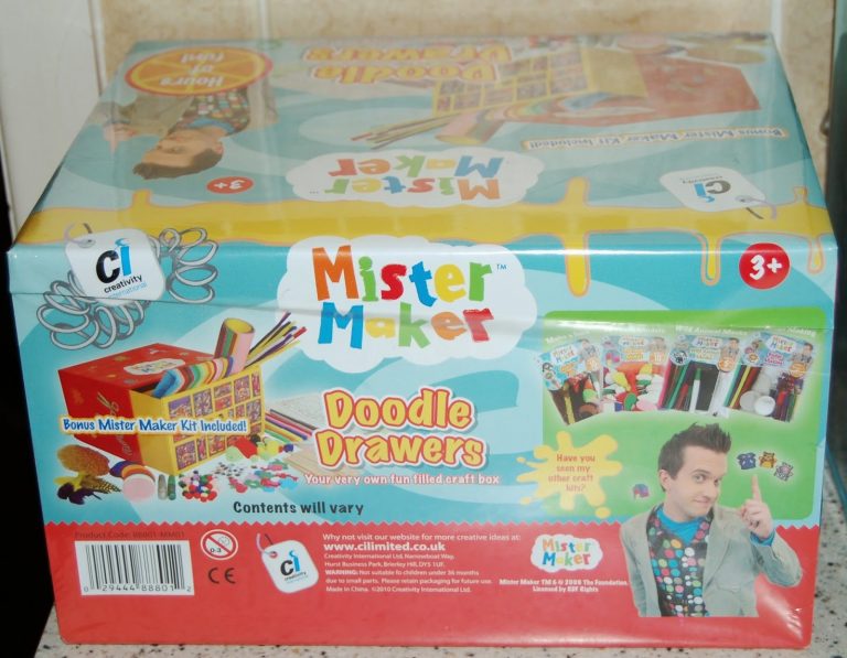 A boxed Mister Maker Doodle Drawers craft kit for ages 3 and up, featuring colourful art supplies and images of the kit contents, with a picture of Mister Maker on the front.