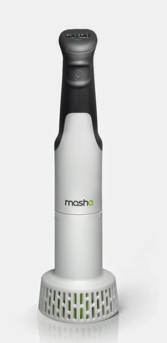 A white and grey handheld kitchen appliance labelled "Masha," designed for creating Perfect Mash or blending mashed potatoes, featuring a vented base and an ergonomic handle.