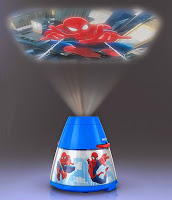 A blue cone-shaped projector decorated with Spider-Man images projects a large, vivid image of Spider-Man swinging through a city—perfect for adding excitement to any child's bedroom or decorated room.