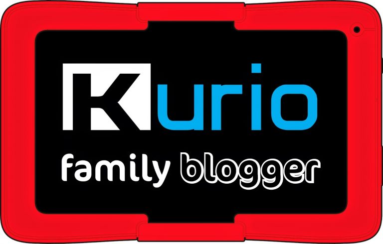 A red Kurio tablet displays the Kurio logo in blue and white, with the words "family blogger" written in white and grey on a black screen.