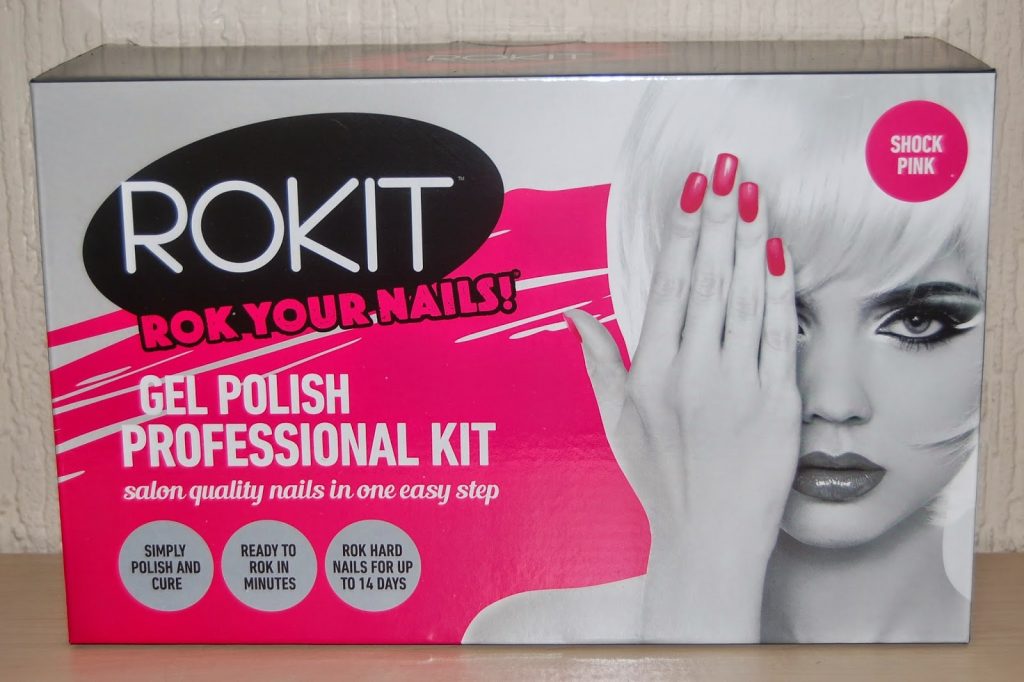 A ROKIT Gel Polish Professional Kit box featuring a black-and-white image of a woman with platinum blonde hair and pink nails, partially covering her face. Text highlights the kit’s features and “Shock Pink” shade—perfect for beauty gifts or unique gift ideas.