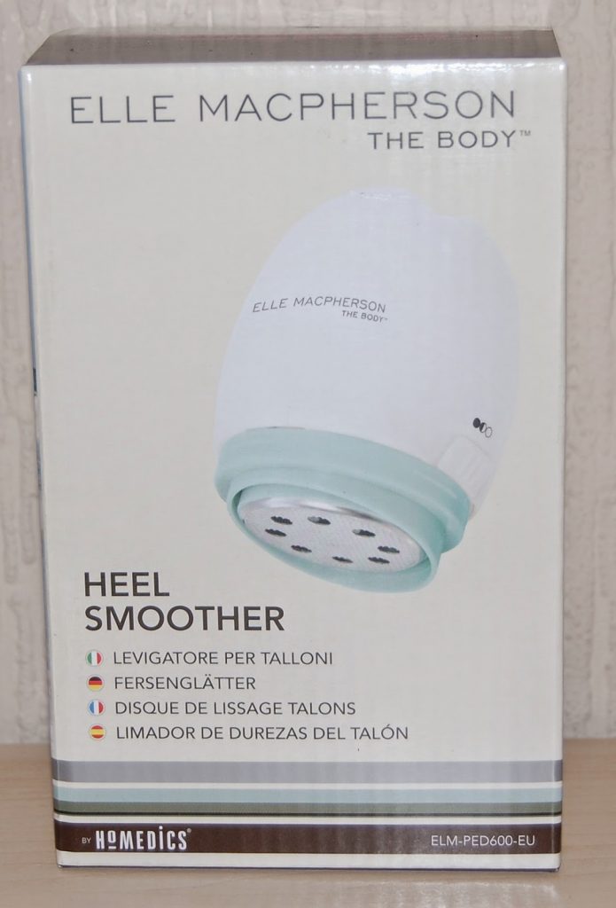 Box of "Elle Macpherson The Body Heel Smoother" by HoMedics, featuring product image and name, plus a description in multiple languages on the front—one of the perfect beauty gift ideas or Mother’s Day gifts for any mum.