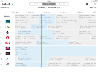 A TabletTV guide on a tablet screen shows different channels, programmes, and times for Thursday, 17 September 2015, from 1:00 pm to 2:30 pm. Channels like BBC One, ITV, and Channel 4 are featured for easy browsing and review.
