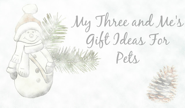 A soft, snowy illustration features a smiling snowman in a hat and scarf, surrounded by pine branches, a pine cone, and the text: "My Three and Me's Gift Ideas For Pets." Perfect for those seeking festive inspiration for furry friends.