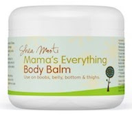 A white jar labelled "Shea Moist Mama's Everything Body Balm" by shea mooti, designed for use on boobs, belly, bottom, and thighs, and decorated with a small tree graphic.