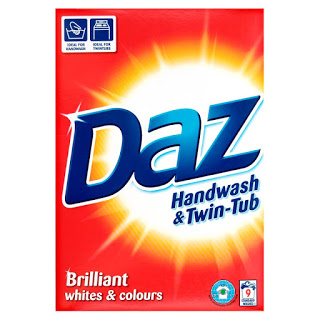 Box of Daz Handwash & Twin-Tub washing powder, featuring a bright sunburst design, blue and white logo, and “Brilliant whites & colours” text—an essential laundry choice fit for Lady Mary or any Downton Abbey nation household.