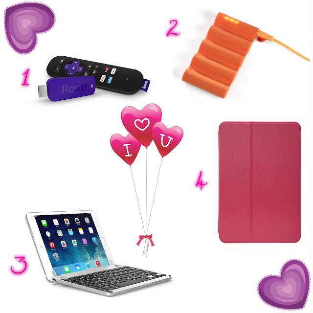 A collage with four technology gift ideas: 1. Roku streaming stick with remote, 2. Orange portable charger, 3. Tablet with keyboard, 4. Pink tablet case. In the centre are three heart balloons with "I ♥ U." Purple hearts decorate the corners.