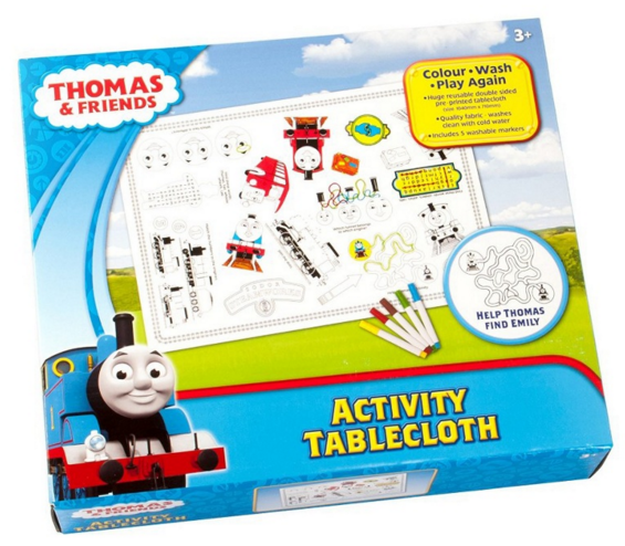 Box for an activity tablecloth featuring Thomas and Friends. The front shows Thomas the Tank Engine, a washable tablecloth with drawings, and 4 felt-tip pens. Text highlights how children can colour, wash, reuse, and enjoy hours of creativity!.
