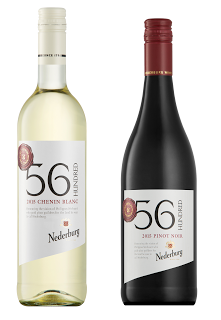 Two wine bottles stand side by side: one white Nederburg 56 Hundred Chenin Blanc with a light label and one red Nederburg 56 Hundred Pinot Noir with a dark label and red cap—perfect selections for festive cocktails or Easter drinks.