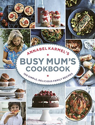 Collage of food dishes and a woman cooking, with the cover title "Annabel Karmel's Busy Mum's Cookbook"—a perfect pick for August books or your Reading This Month list—surrounded by cakes, salads, muffins, and roast chicken.