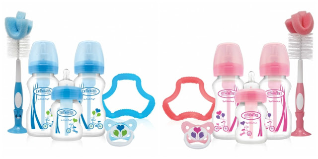 Two Options Gift Sets from Dr Brown's are shown: the left set has blue accents, and the right set has pink. Each includes baby bottles, dummies, bottle brushes, and handle grips—a perfect win for gifting parents.