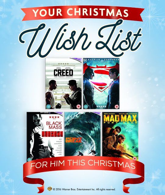 A festive Christmas graphic featuring five film DVDs—Creed, Batman v Superman, Black Mass, The Box, and Mad Max—labelled “Your Christmas Wish List” and “For Him This Christmas” on a blue snowy background. Perfect DVDs for all the family.