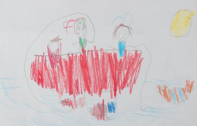 A child’s crayon drawing shows three stick-figure people standing on a large, red boat in blue water, with a yellow sun and another small object nearby. Are You Guilty of Throwing Away Your Child's Artwork? This one is too precious to lose.
