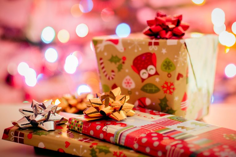A pile of wrapped Personalised Christmas gifts