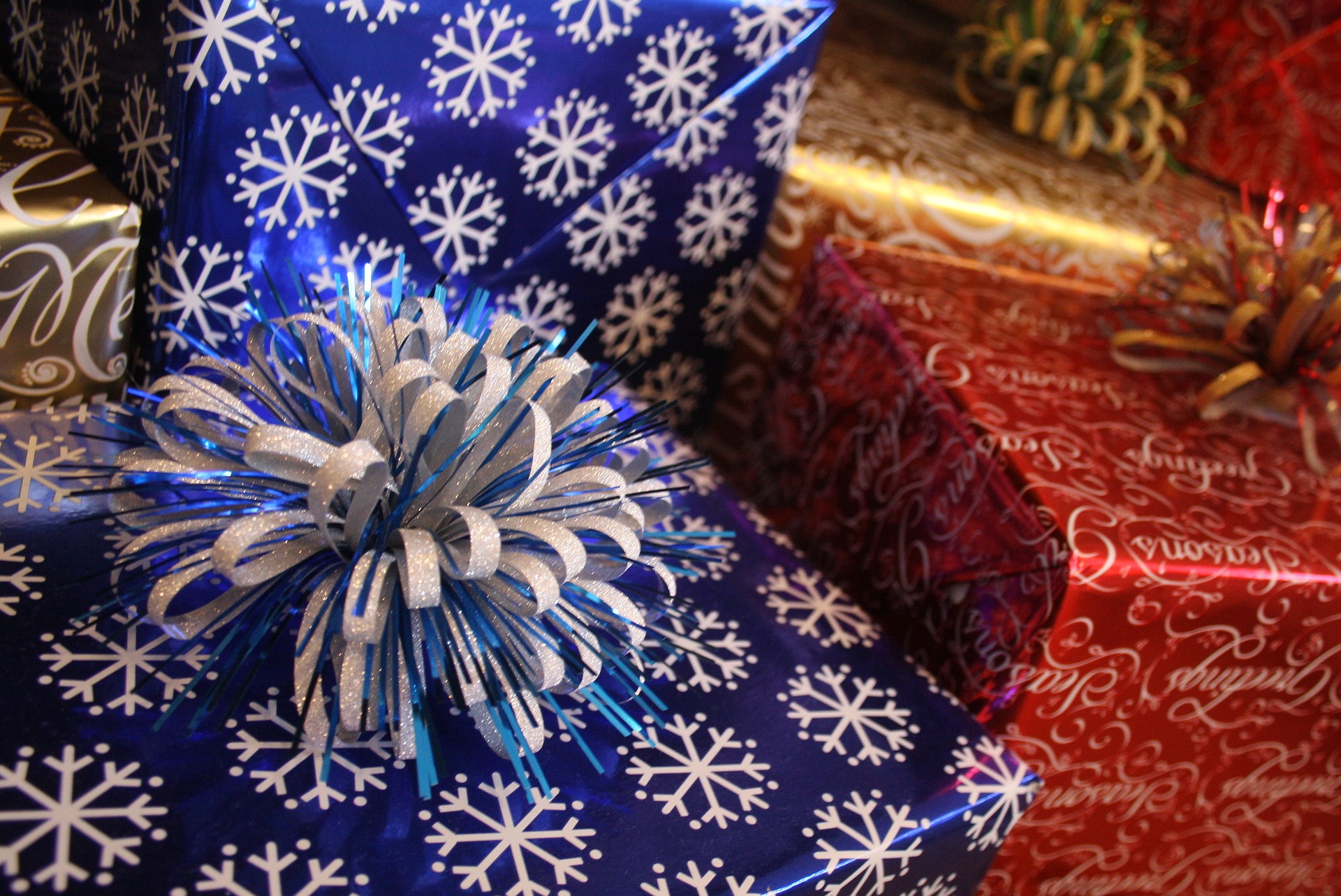 presents wrapped in blue and red wrapping paper