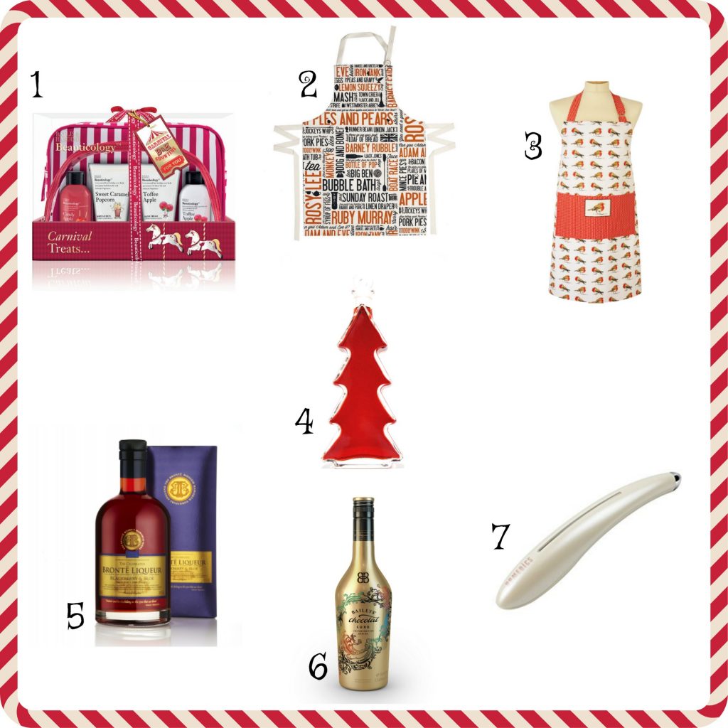 A collage of seven gift items for her, including bath products, two aprons with food prints, a red tree ornament, a bottle of port with chocolate, a gold cream liqueur bottle, and a white electronic skincare device.