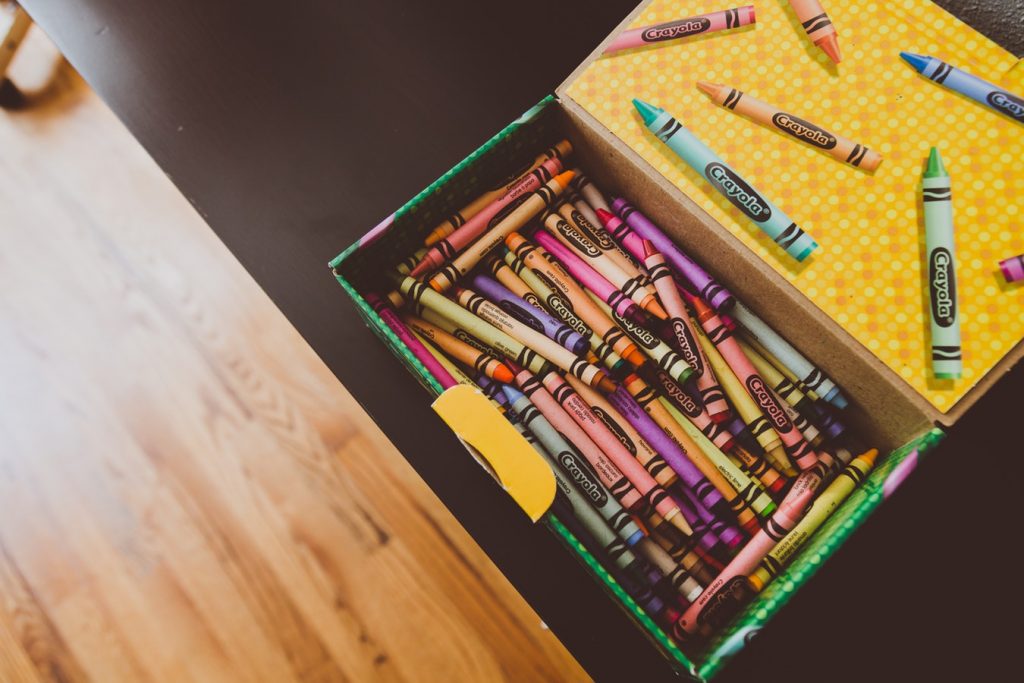 a box full of wax crayons