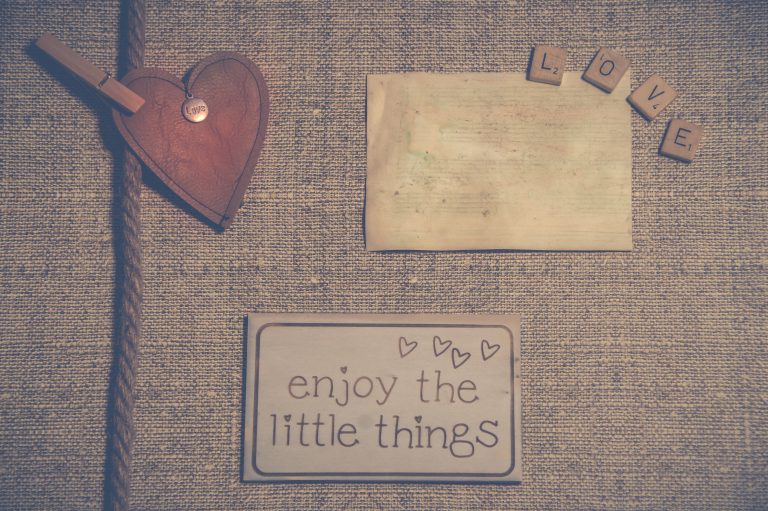 A romantic scrapbook page featuring a heart and two note squares
