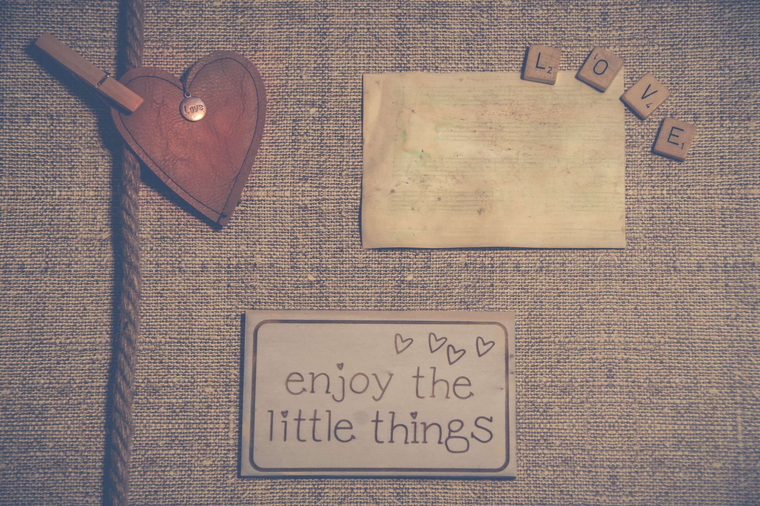 A romantic scrapbook page featuring a heart and two note squares