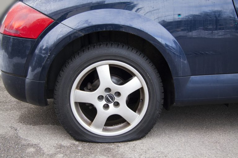 A car with a flat tyre