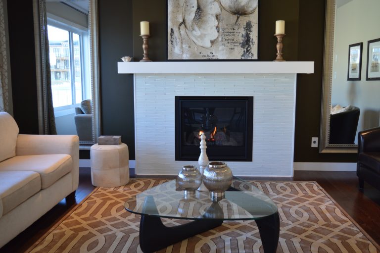 a living room looking directly at the fireplace