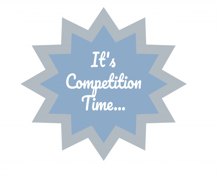 A blue starburst shape with a grey border features the white text "It's Competition Time..." in a playful font, announcing your chance to win a Cadbury Chocolate Hamper.