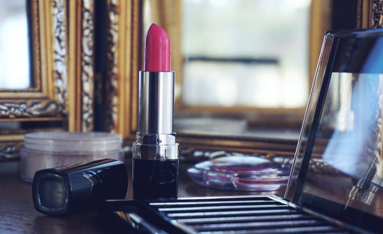 make up and red lip stick