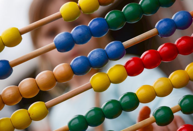child with an abacus