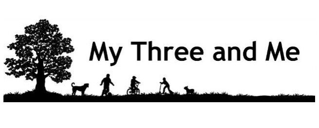 Silhouette of a tree, two children with dogs (one cycling, one playing), and an adult walking, with the text “My Three and Me” beside them on a white background, perfect for a charming mythreeandmelogo.