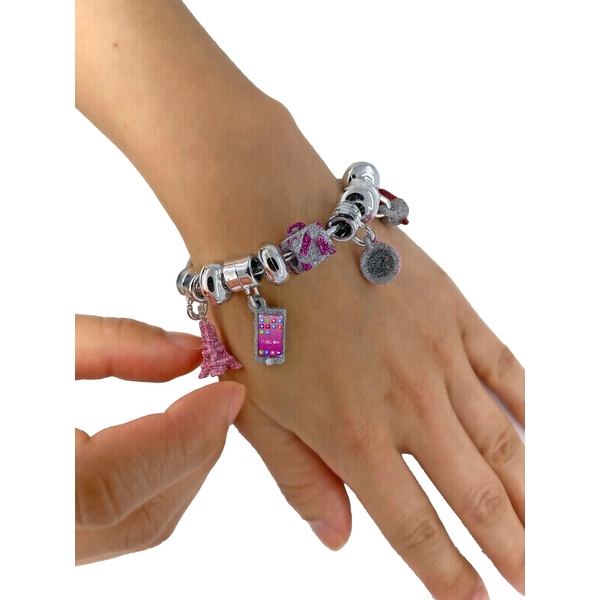A hand with a bracelet, showcasing the playful charm of fashion toys.
