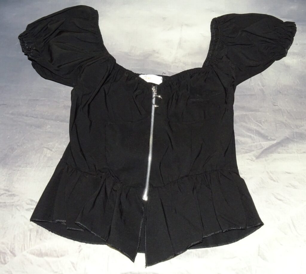 Black peplum top from Femmeluxe