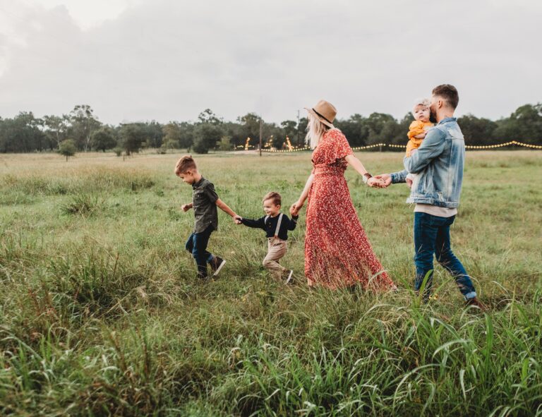 a family walking together in a field