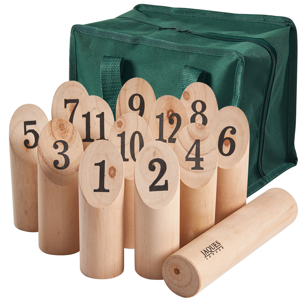 A green carry bag sits behind a set of numbered wooden pins and a throwing pin, arranged in front. Part of a game set featured in the Summer Prize Giveaway from Top UK Bloggers, each pin is marked from 1 to 12.